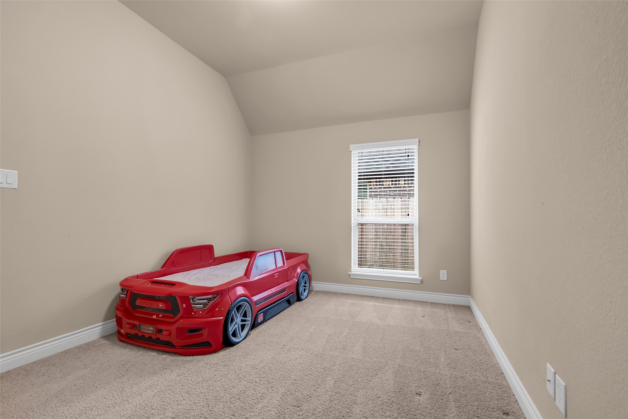 27946 Emory Cove Drive Spring, TX 77386 - Photo 21 of 25 a room with a bed and a window