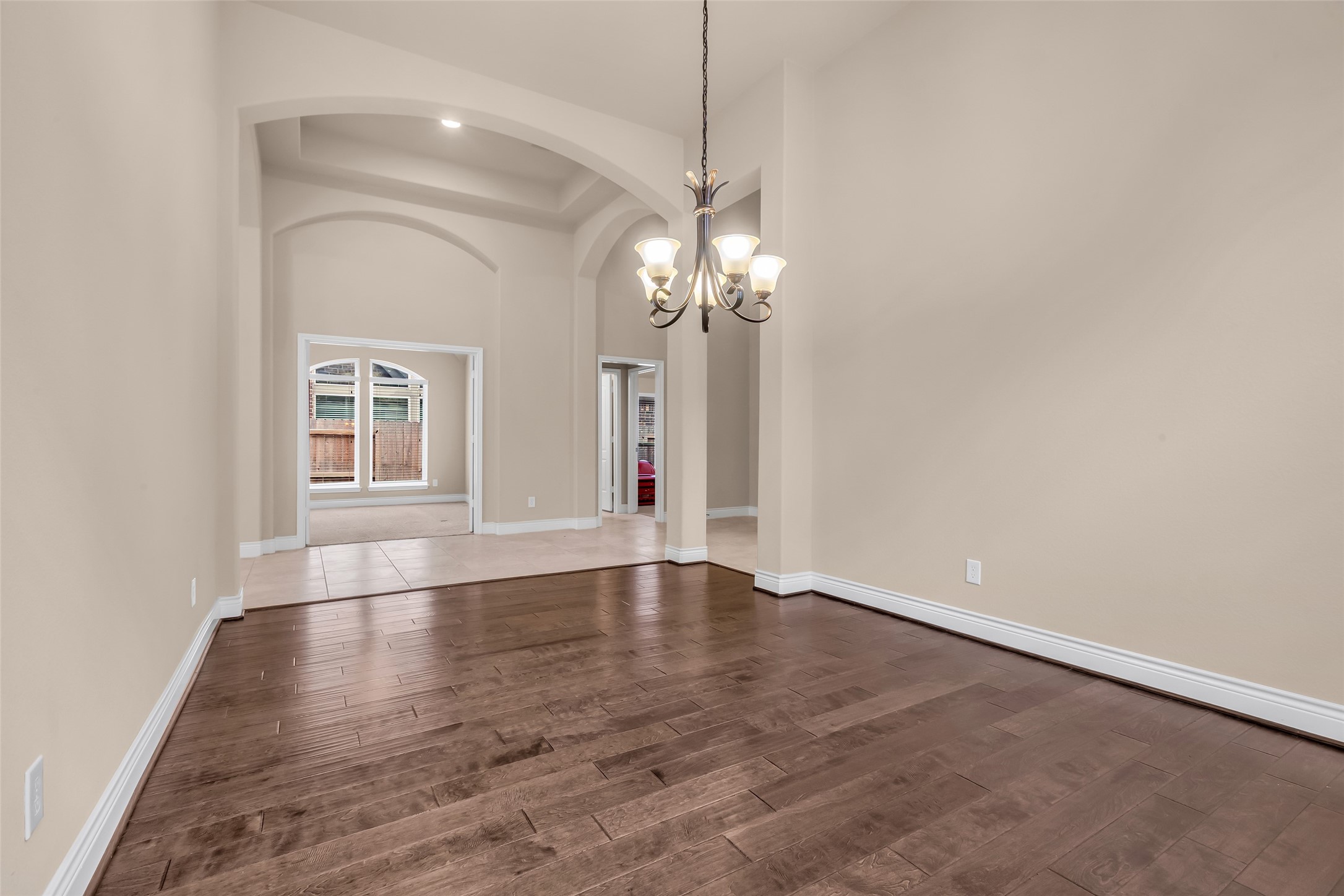 27946 Emory Cove Drive Spring, TX 77386 - Photo 5 of 25 wooden floor in an empty room with a window