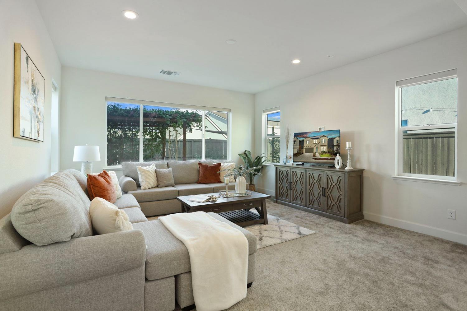 3081 Rio Grande Drive Tracy, CA 95377 - Photo 19 of 60 a living room with furniture window and a flat screen tv