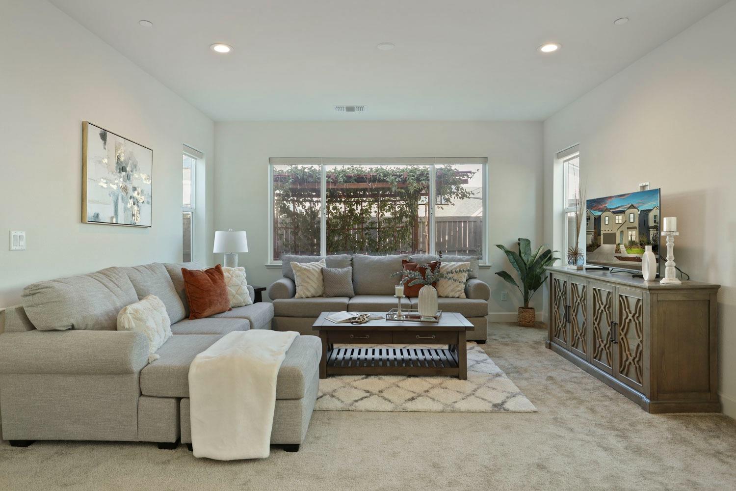 3081 Rio Grande Drive Tracy, CA 95377 - Photo 20 of 60 a living room with furniture and a large window