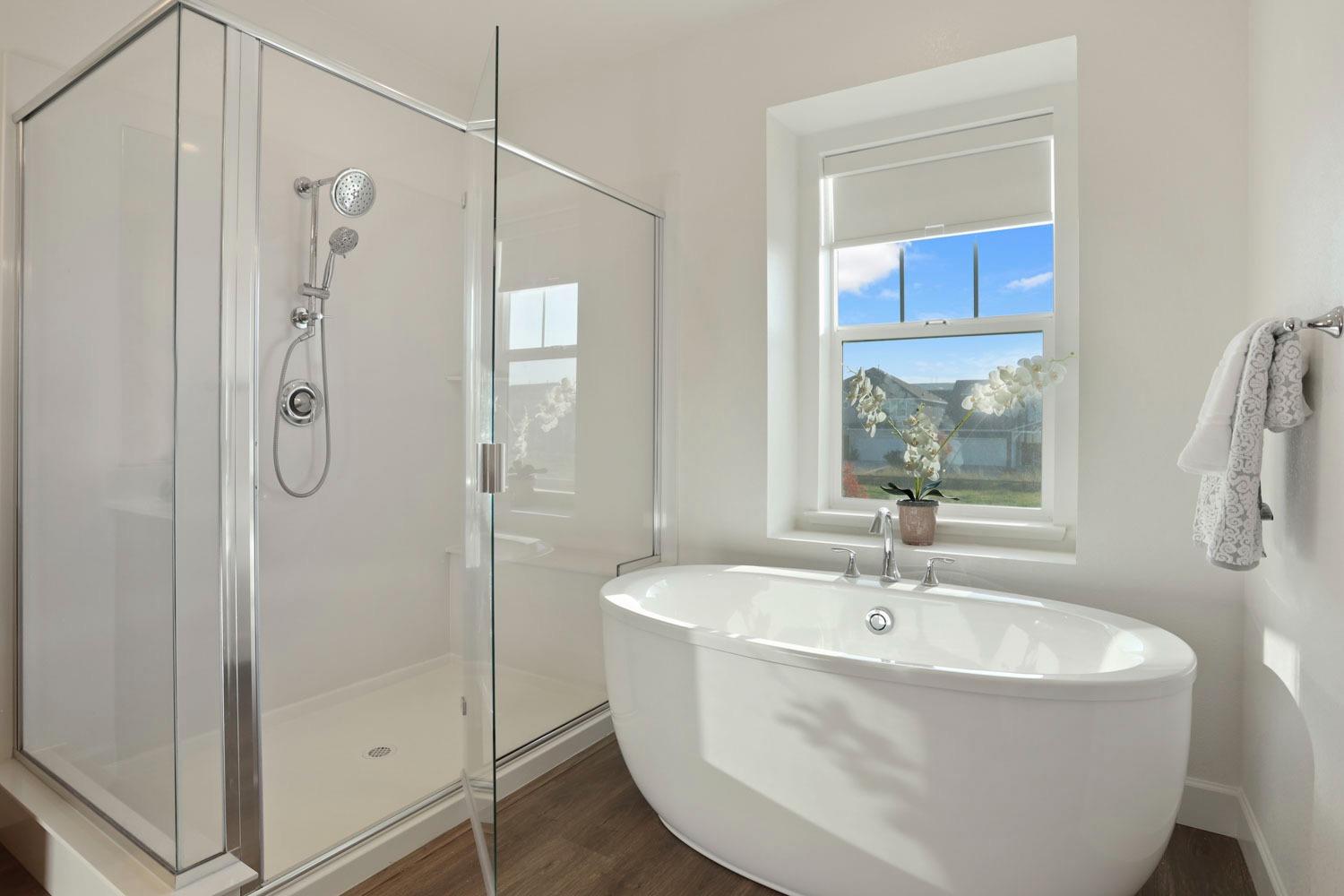 3081 Rio Grande Drive Tracy, CA 95377 - Photo 39 of 60 a white bath tub sitting next to a shower