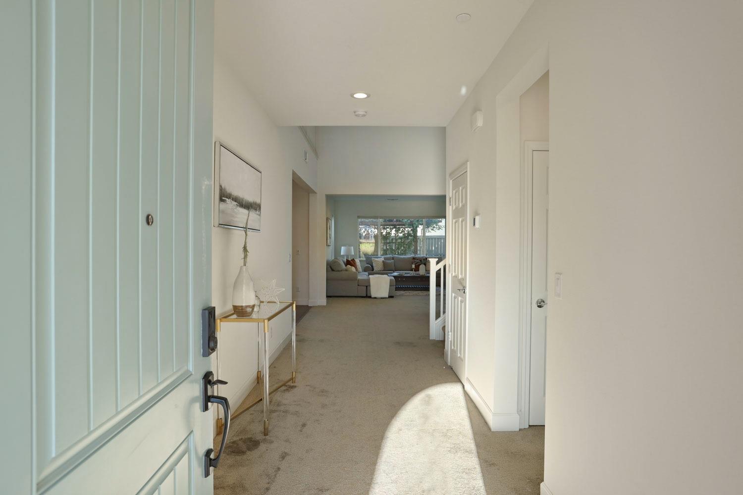 3081 Rio Grande Drive Tracy, CA 95377 - Photo 6 of 60 a view of a hallway with a livingroom and a chair