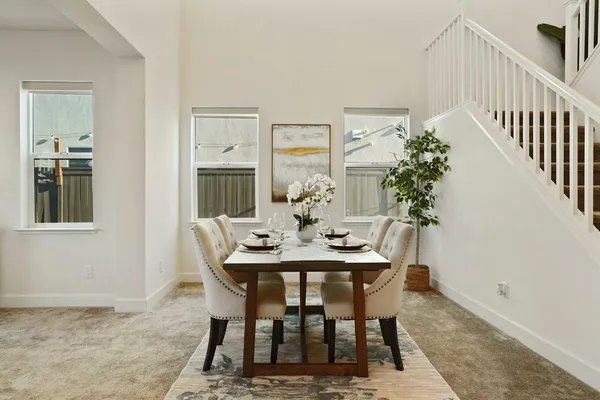 a view of a dining room with furniture