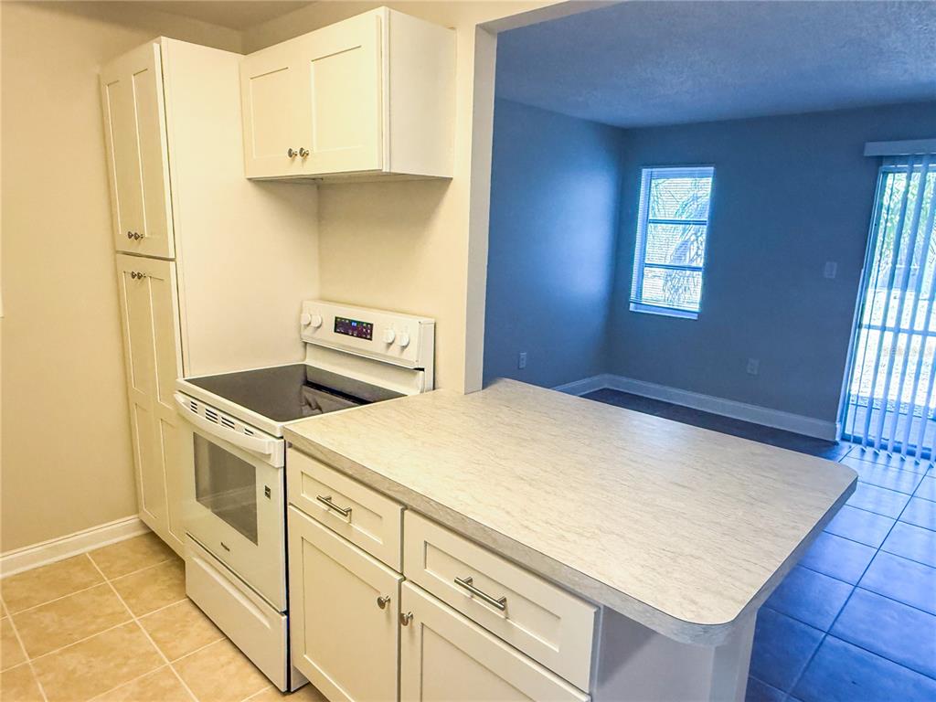 377 South McMullen Booth Road, Unit 97 Clearwater, FL 33759 - Photo 11 of 21 a utility room with dryer and washer