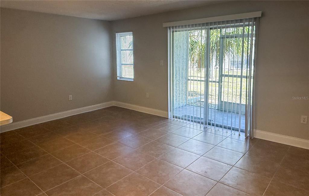 377 South McMullen Booth Road, Unit 97 Clearwater, FL 33759 - Photo 14 of 21 a view of an empty room with a window