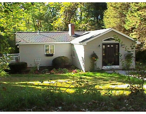 234 Old Stonebridge Road Wayland, MA 01778 - Photo 1 of 8 a view of a house with a yard