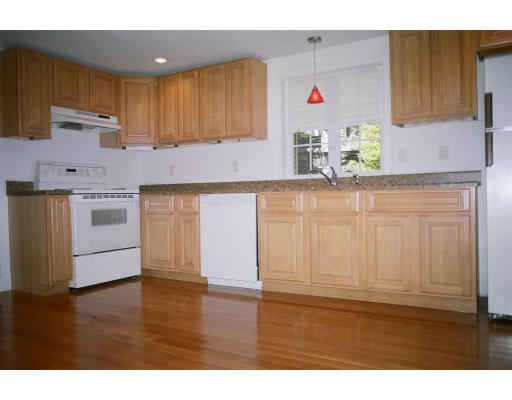 234 Old Stonebridge Road Wayland, MA 01778 - Photo 4 of 8 a kitchen with stainless steel appliances granite countertop a sink and cabinets