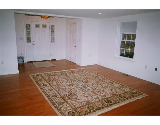234 Old Stonebridge Road Wayland, MA 01778 - Photo 7 of 8 a view of wooden floor and windows in a room