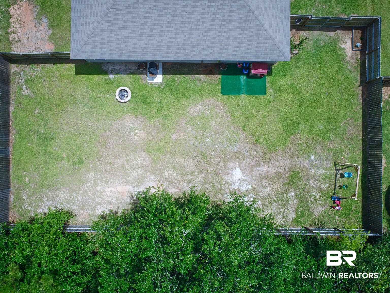 12099 Cressida Loop Daphne, AL 36526 - Photo 43 of 46 6 Ft privacy fence and woods behind