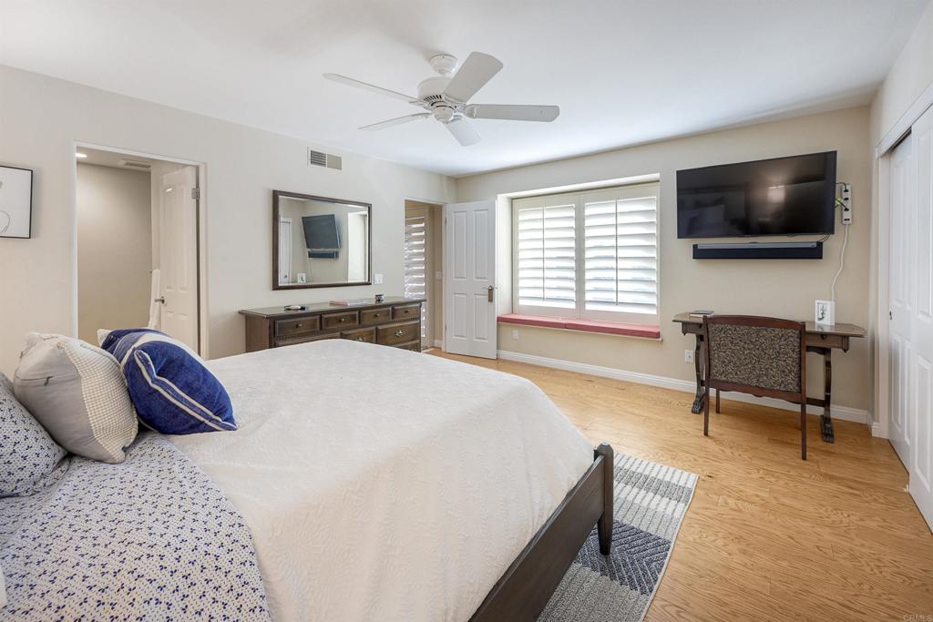 16142 El Tae Road Pauma Valley, CA 92061 - Photo 21 of 63 a bedroom with a bed and a flat screen tv
