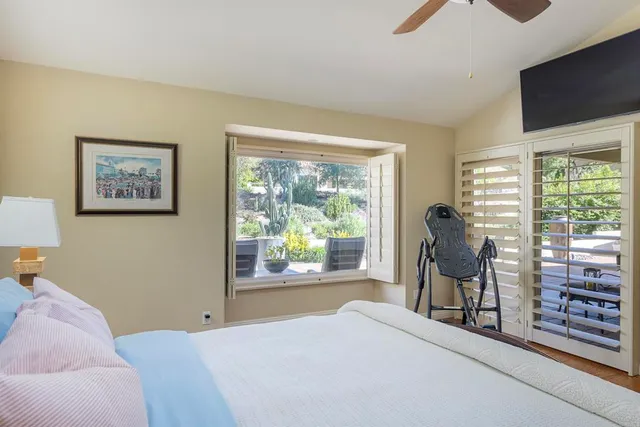 a view of a balcony and chairs