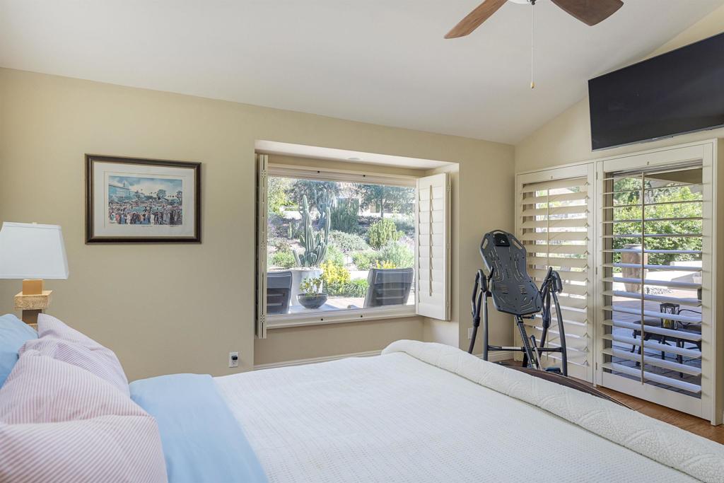 16142 El Tae Road Pauma Valley, CA 92061 - Photo 24 of 63 a bedroom with furniture and a large window