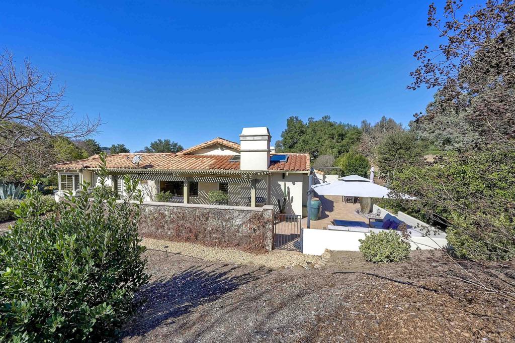 16142 El Tae Road Pauma Valley, CA 92061 - Photo 31 of 63 a view of a house with a patio
