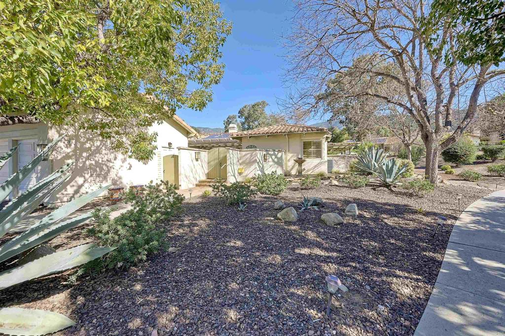16142 El Tae Road Pauma Valley, CA 92061 - Photo 4 of 63 a front view of a house with garden