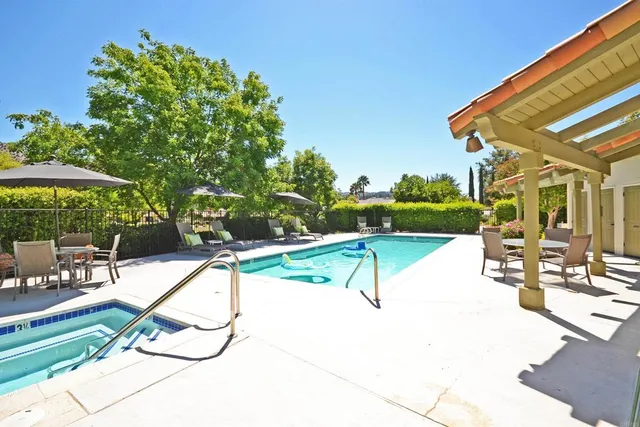 a front view of a house with swimming pool