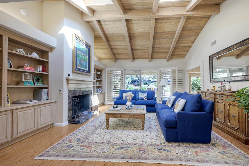 16142 El Tae Road Pauma Valley, CA 92061 - Photo 7 of 63 a living room with furniture fireplace and a flat screen tv