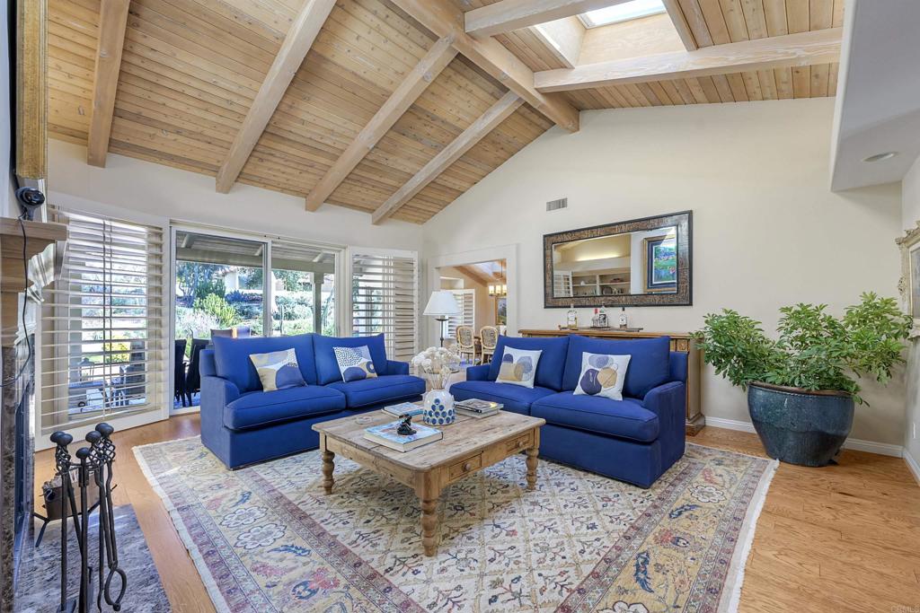 16142 El Tae Road Pauma Valley, CA 92061 - Photo 9 of 63 a living room with furniture potted plant and a large window