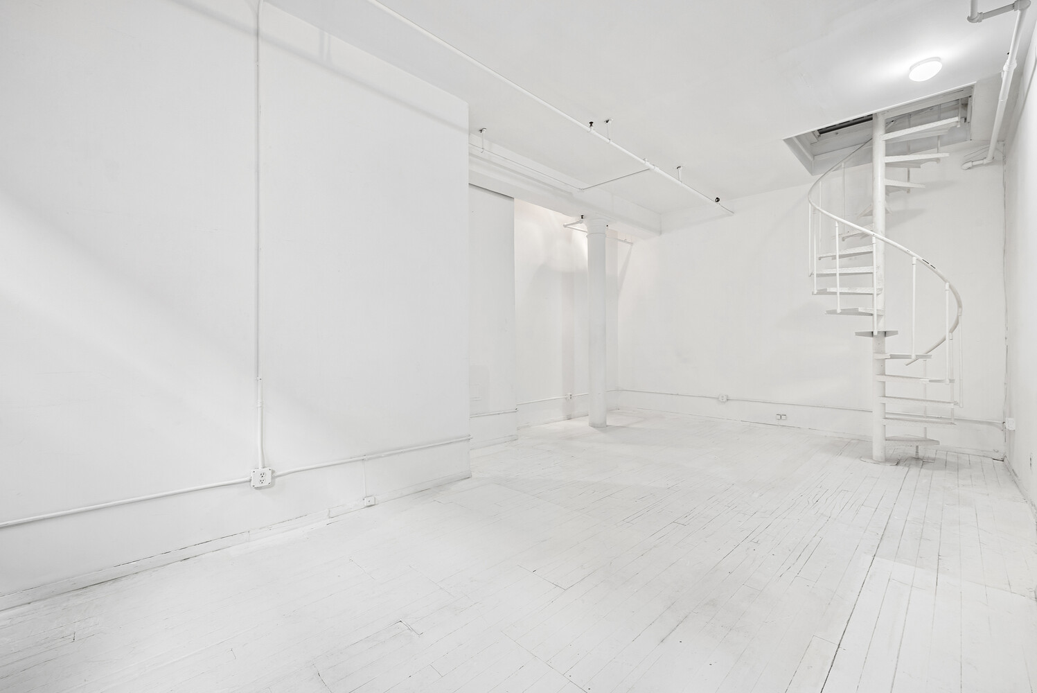 108 Wooster Street, Unit 3A Manhattan, NY 10012 - Photo 8 of 10 a view of an empty room