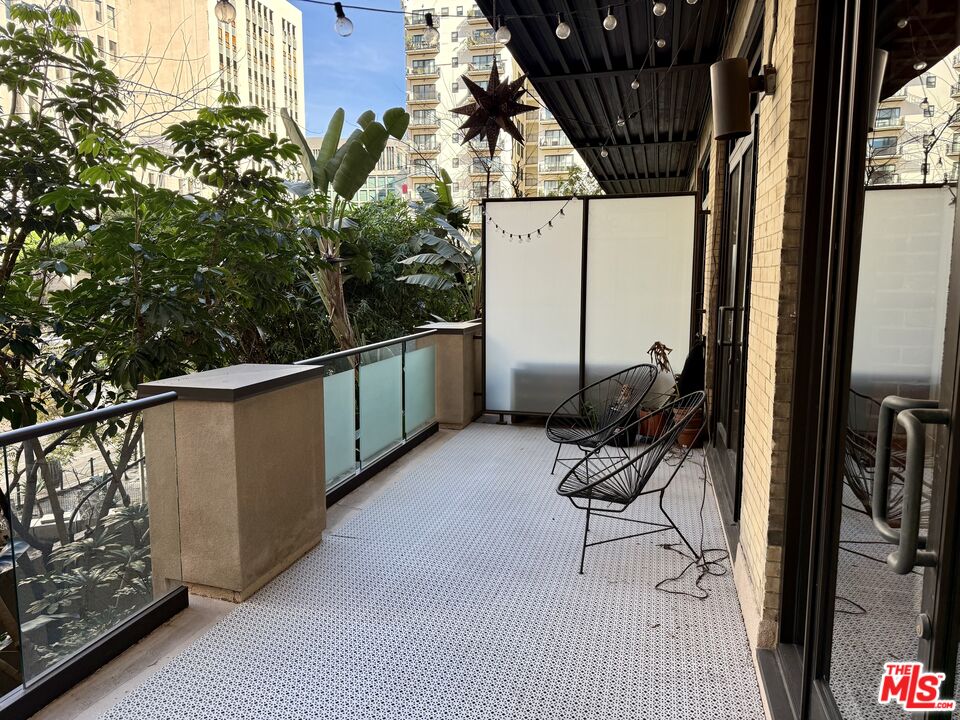 460 South Spring Street, Unit 205 Los Angeles, CA 90013 - Photo 13 of 18 a view of balcony and patio