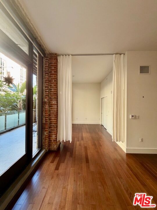 460 South Spring Street, Unit 205 Los Angeles, CA 90013 - Photo 4 of 10 a view of gallery with wooden floor