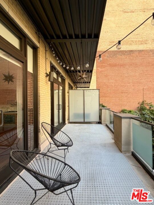 460 South Spring Street, Unit 205 Los Angeles, CA 90013 - Photo 10 of 10 a view of balcony with furniture