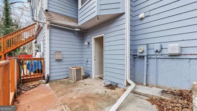 a view of a wooden door of the house