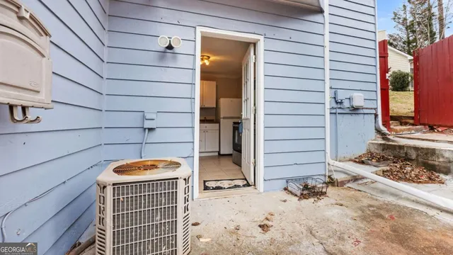 a view of a door and a window
