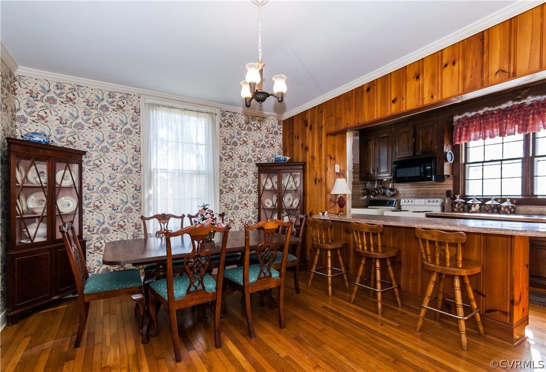 11513 Beach Road Chesterfield, VA 23838 - Photo 11 of 29 a view of a dining room with furniture window and wooden floor
