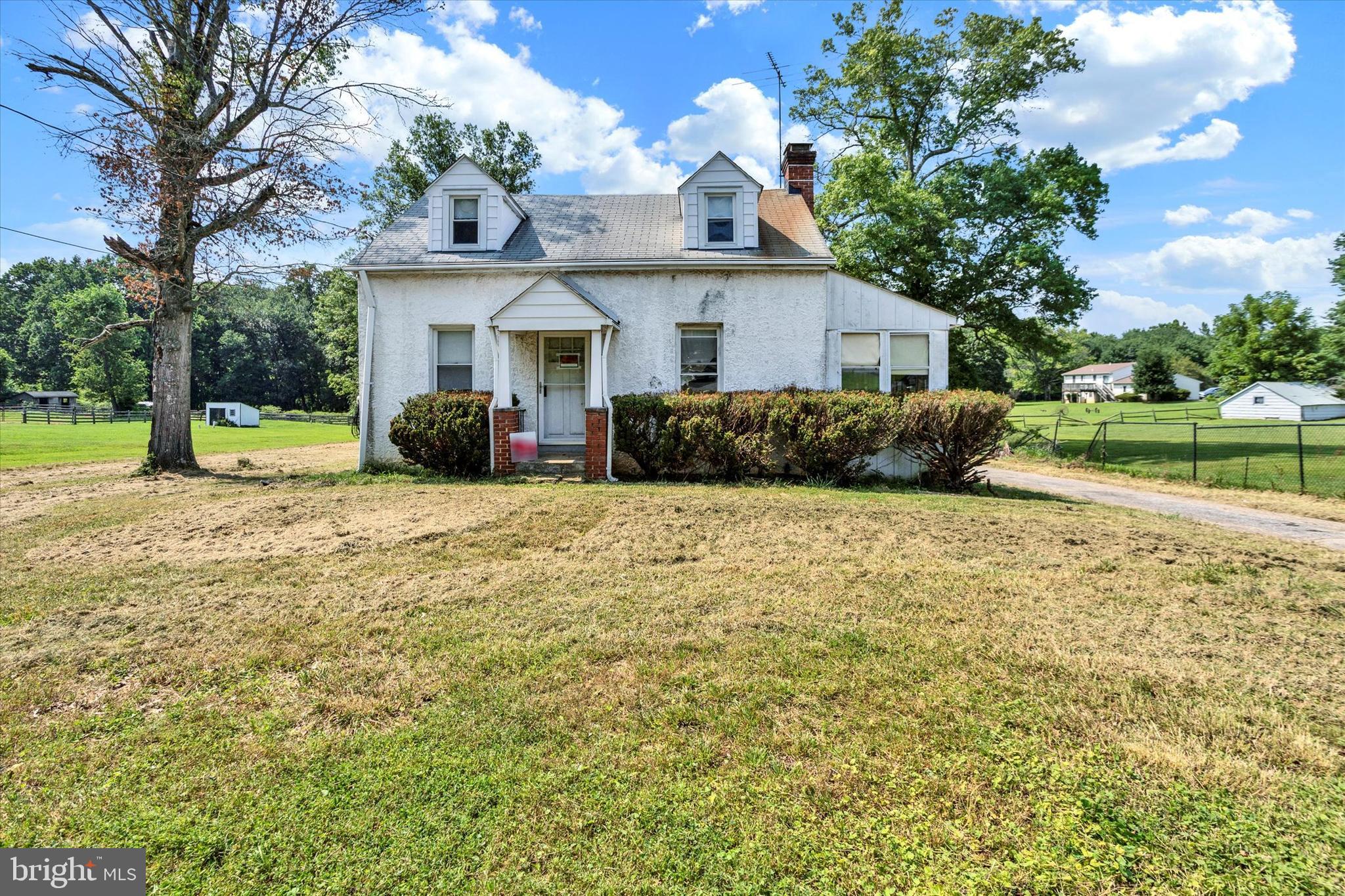 15526 Holly Grove Road Silver Spring, MD 20905 - Photo 1 of 19 a view of a house with a yard and tree s