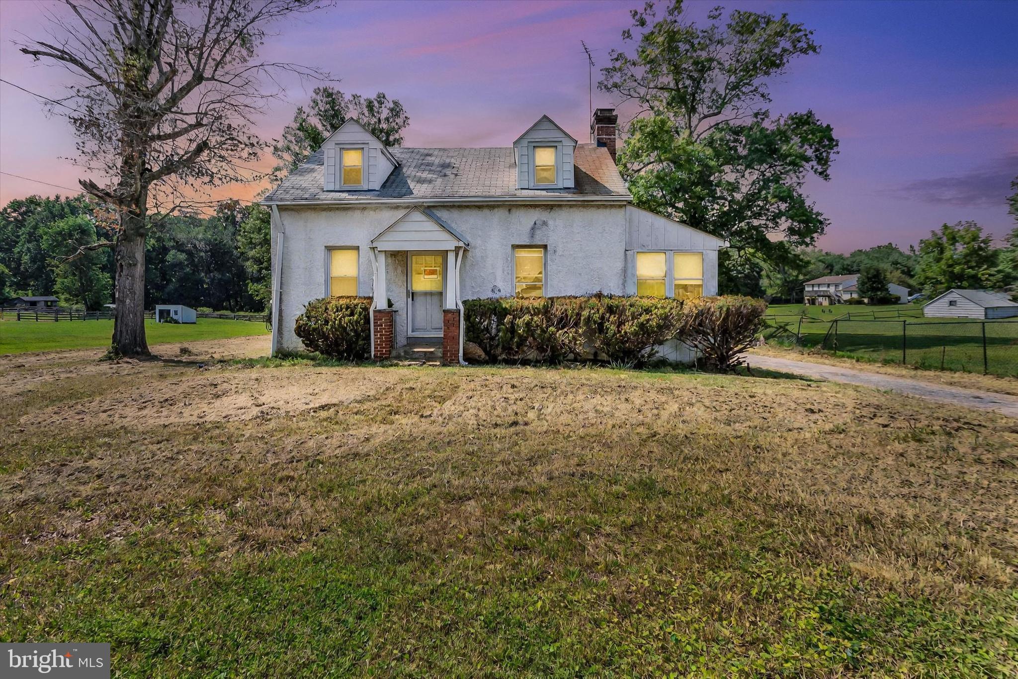 15526 Holly Grove Road Silver Spring, MD 20905 - Photo 19 of 19 a front view of a house with a yard