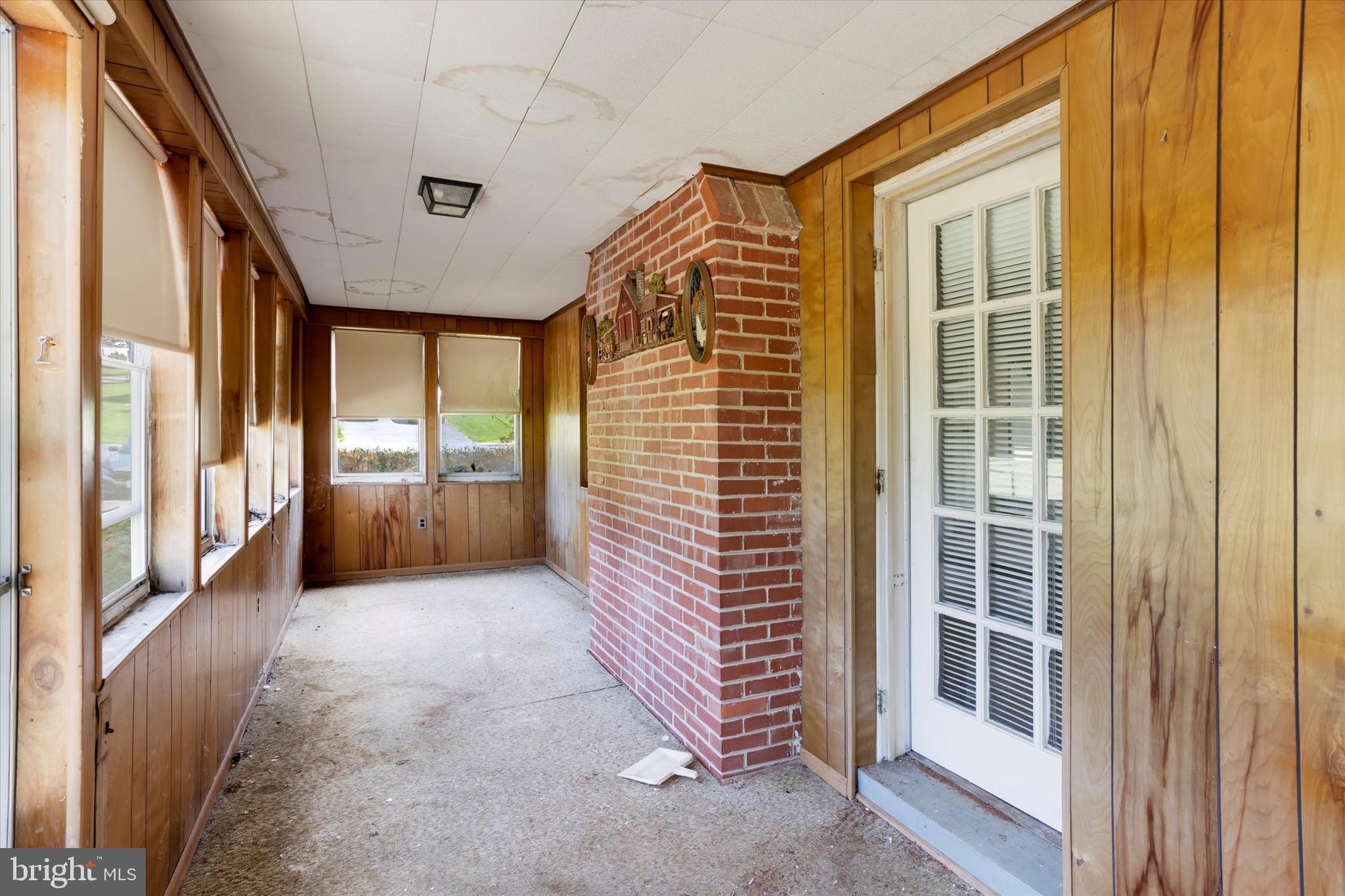 15526 Holly Grove Road Silver Spring, MD 20905 - Photo 4 of 19 a view of gallery with windows