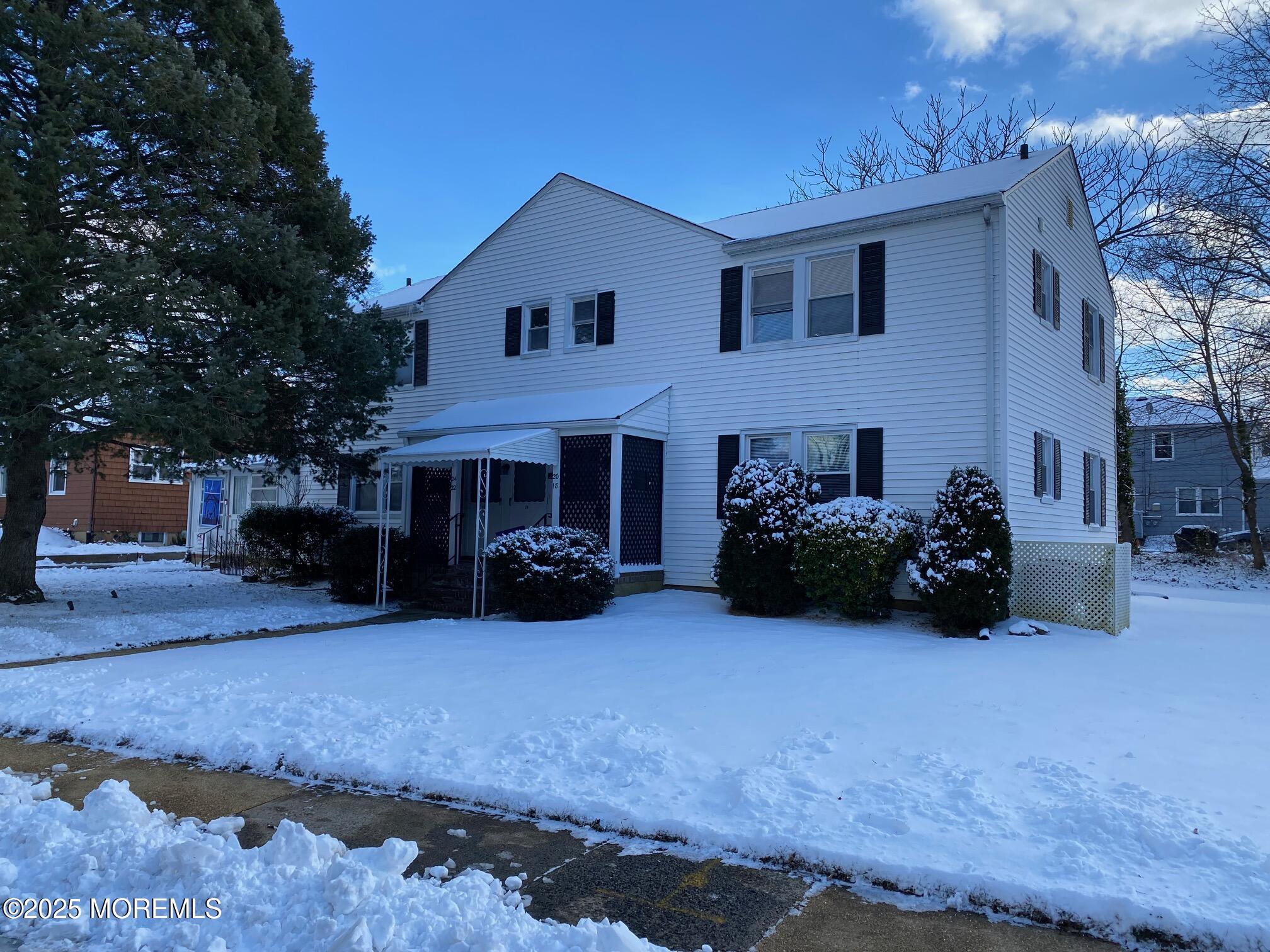20 Oldfield Place Red Bank, NJ 07701 - Photo 6 of 11 a view of a house with that has a bed and a large tree