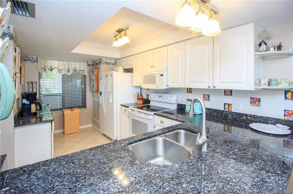 4540 Northeast Sandpebble Trace, Unit 204 Jensen Beach, FL 34957 - Photo 10 of 38