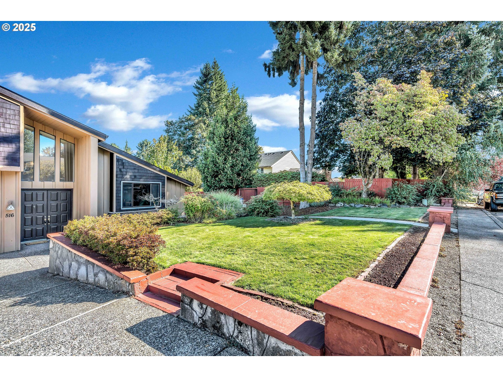 a view of an house with backyard porch and sitting area