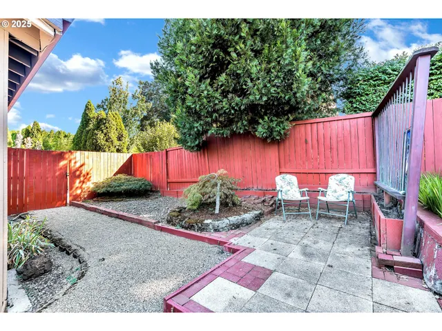 a garden view with a seating space