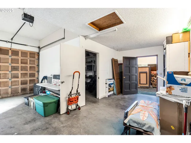 a room with furniture and a flat screen tv