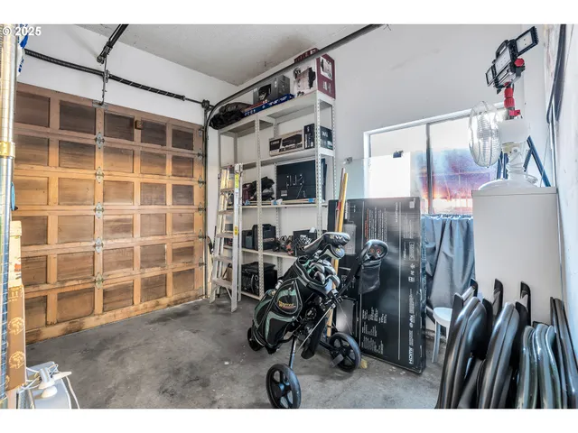a view of a livingroom with furniture and gym equipment