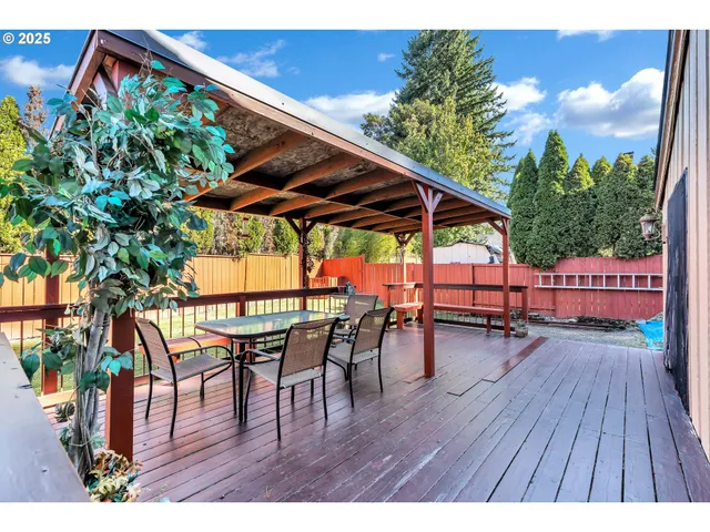 swimming pool view with a seating space