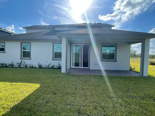 a view of a house with a garden