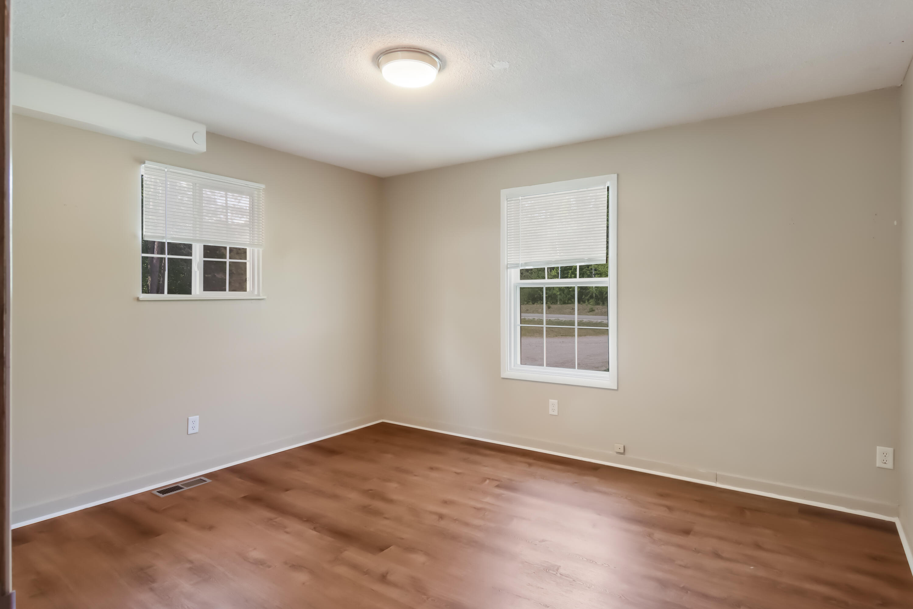 12414 Coster Road Southwest Fife Lake, MI 49633 - Photo 16 of 29 Left Side Bedroom 1