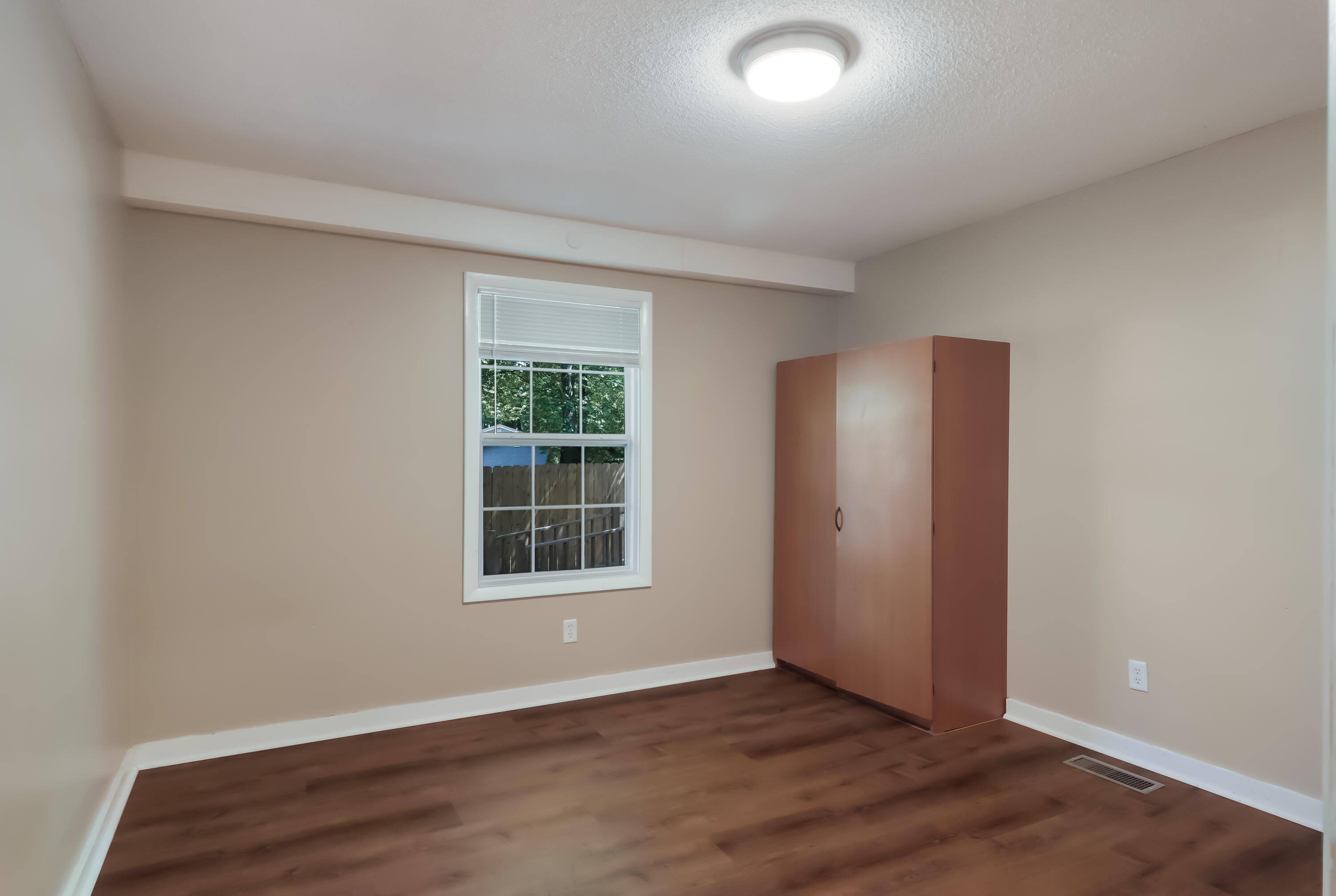 12414 Coster Road Southwest Fife Lake, MI 49633 - Photo 18 of 29 Left Side Bedroom 3