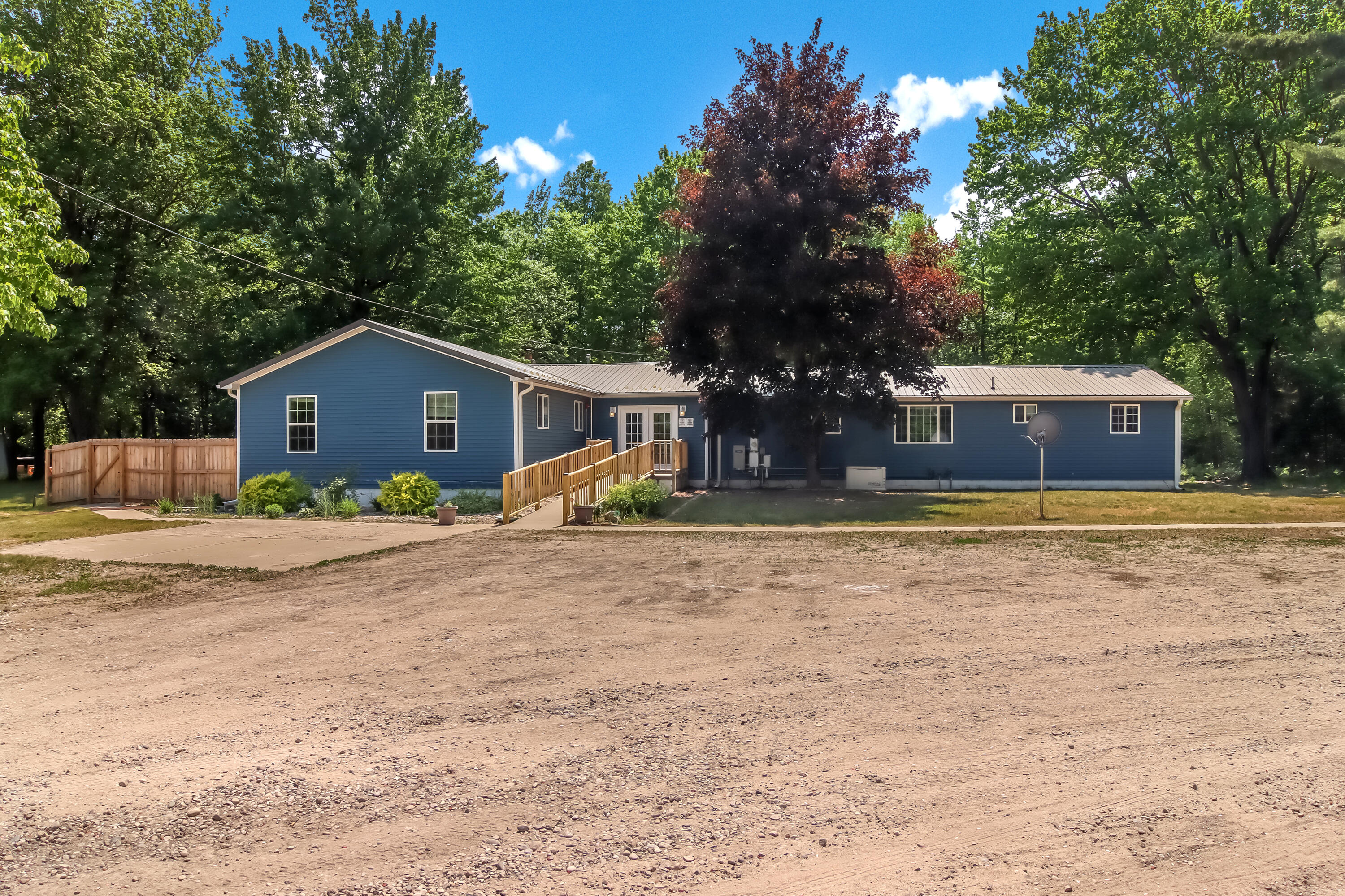 12414 Coster Road Southwest Fife Lake, MI 49633 - Photo 2 of 29 Front