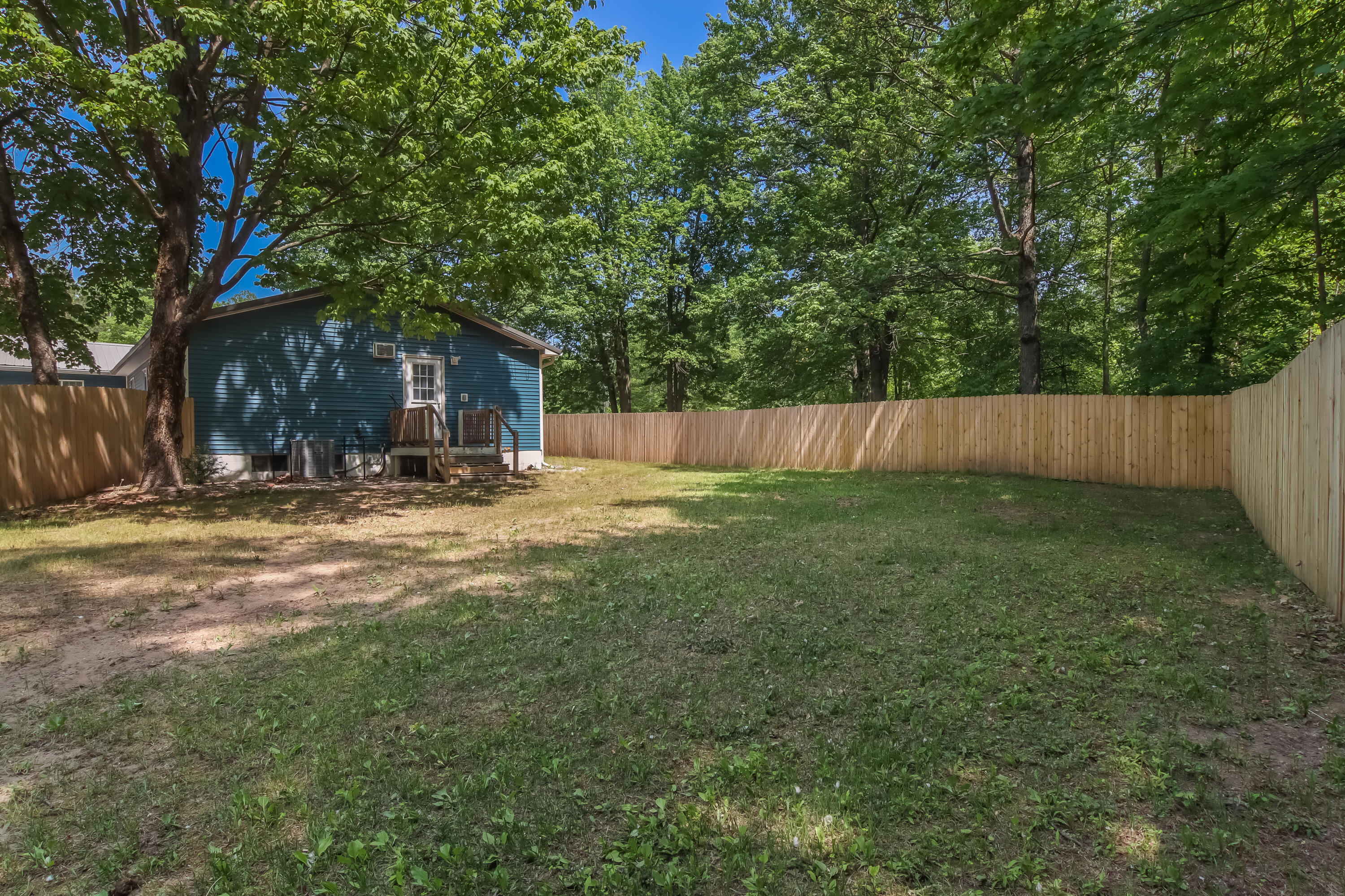 12414 Coster Road Southwest Fife Lake, MI 49633 - Photo 3 of 29 Back Yard
