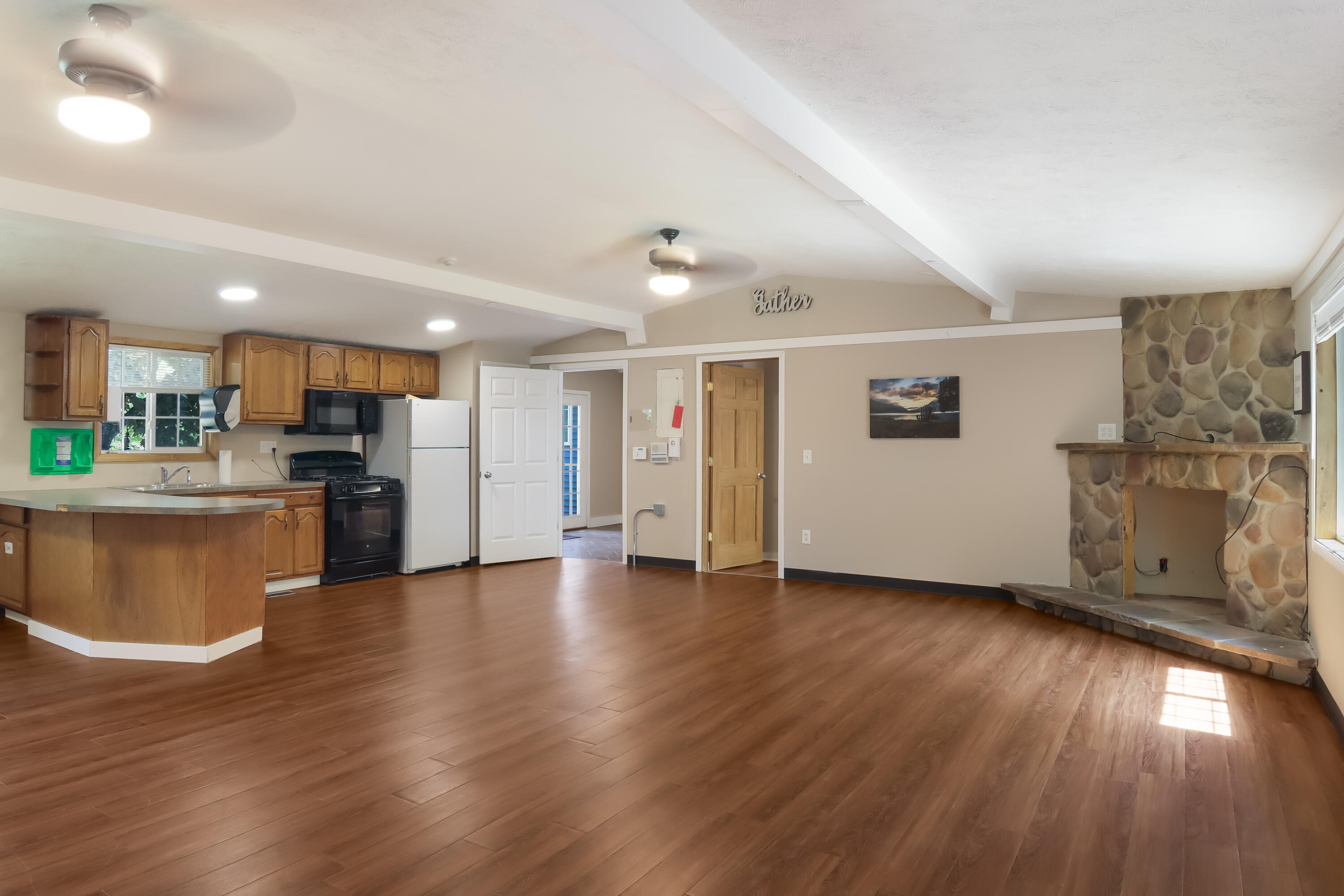 12414 Coster Road Southwest Fife Lake, MI 49633 - Photo 8 of 29 Right Side Kitchen Living Room
