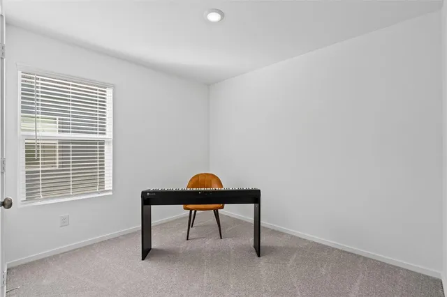 a room with furniture and a window
