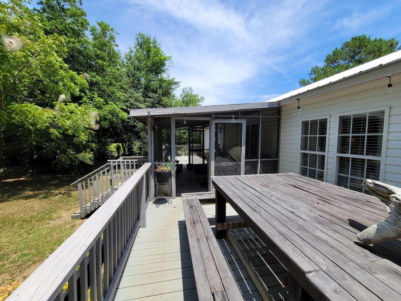 7295 Awendaw Landing Road Awendaw, SC 29429 - Photo 25 of 48 Huge Deck with Screen Porch & Sundeck