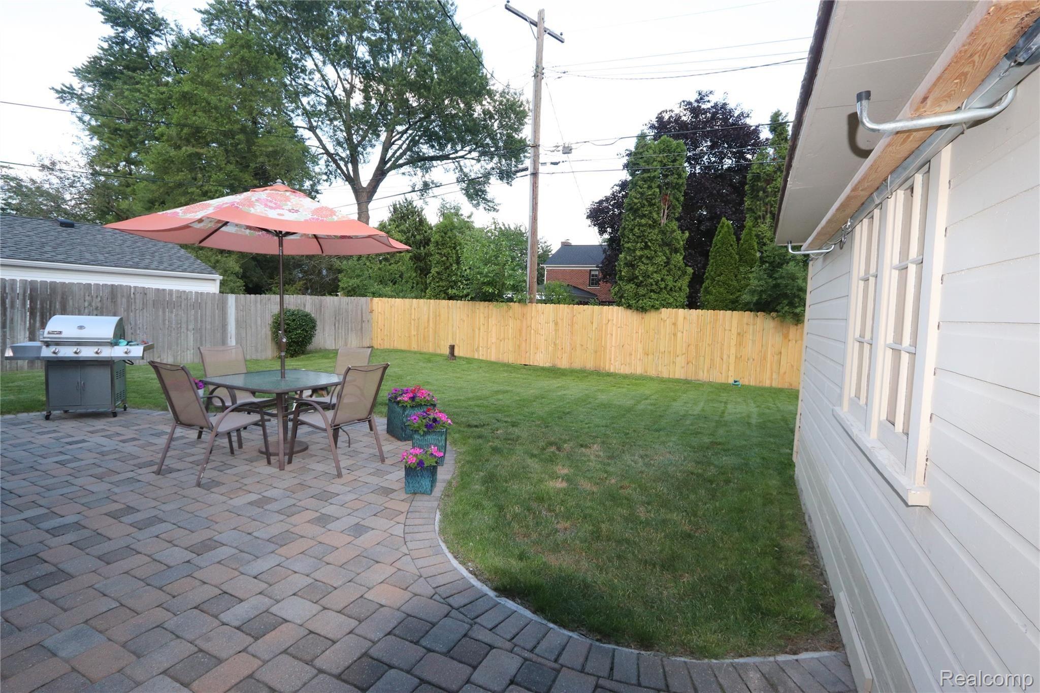 2827 Bembridge Road Royal Oak, MI 48073 - Photo 4 of 38 IMG_8387 REAR, PATIO, FENCE.JPG
