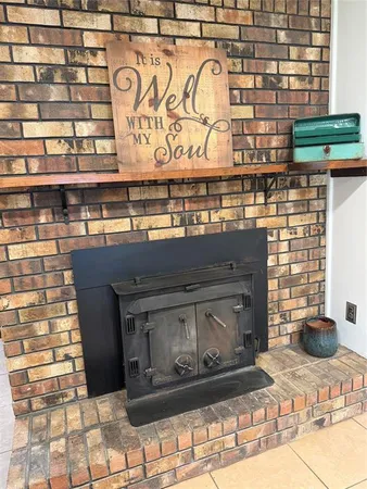 a stove top oven sitting inside of a kitchen