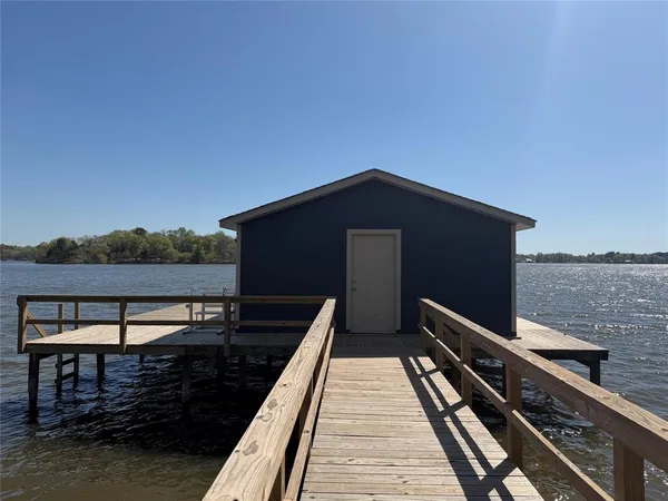 a terrace with outdoor seating and city view