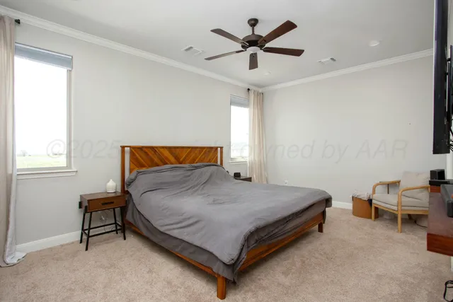 a bedroom with a bed and a table in it